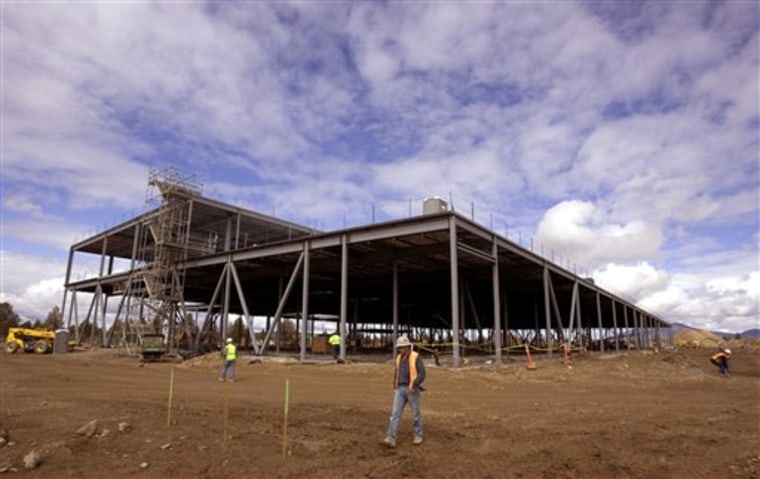 Girders for Facebook's first-ever data center rise out of high desert scrub land in Prineville, Ore.